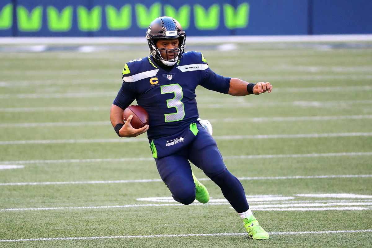 Russell Wilson #3 of the Seattle Seahawks prepares to slide to the ground in the third quarter against the San Francisco 49ers at CenturyLink Field on November 01, 2020 in Seattle, Washington.