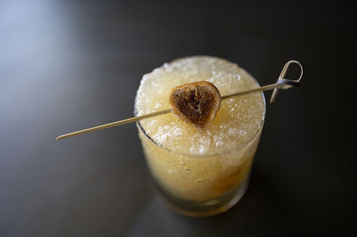 A whiskey fig cobbler cocktail at Clique Bistro