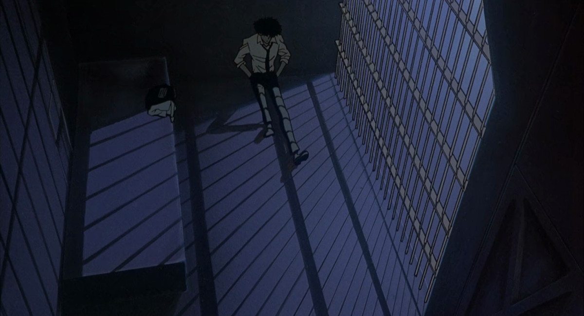 Spike sitting in a jail cell in Cowboy Bebop: The Movie