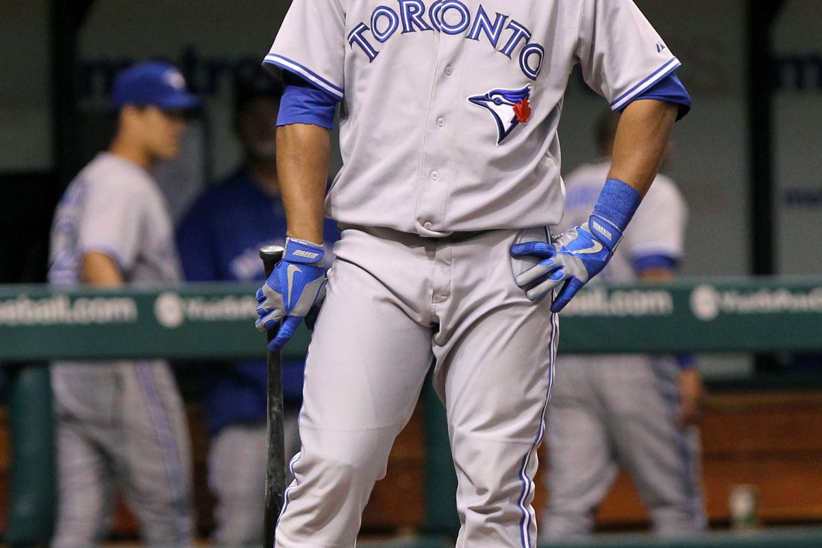 August 8, 2012; St. Petersburg, FL, USA; Toronto Blue Jays first baseman Edwin Encarnacion (10) is not impressed.
