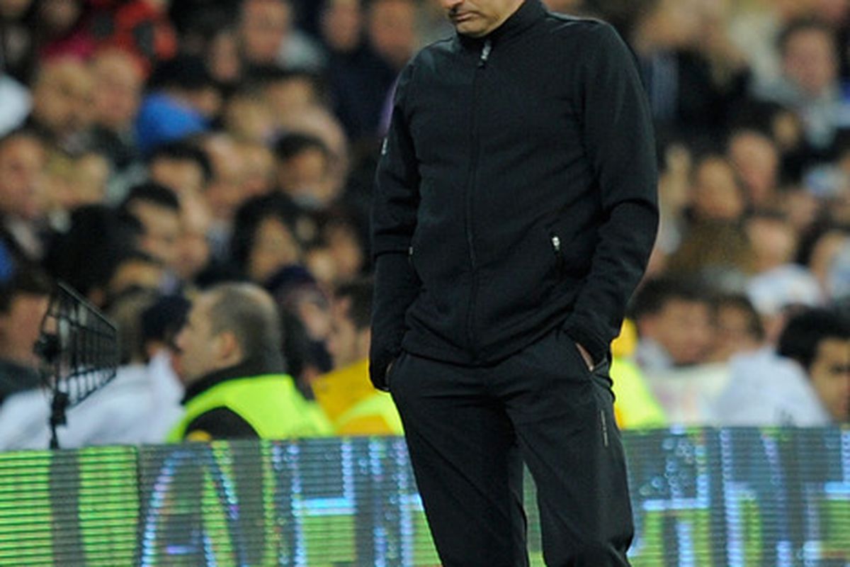 MADRID, SPAIN - MARCH 18:  Real Madrid coach Jose Mourinho reacts during the La Liga match between Real Madrid CF and Malaga CF at Estadio Santiago Bernabeu on March 18, 2012 in Madrid, Spain.  (Photo by Denis Doyle/Getty Images)