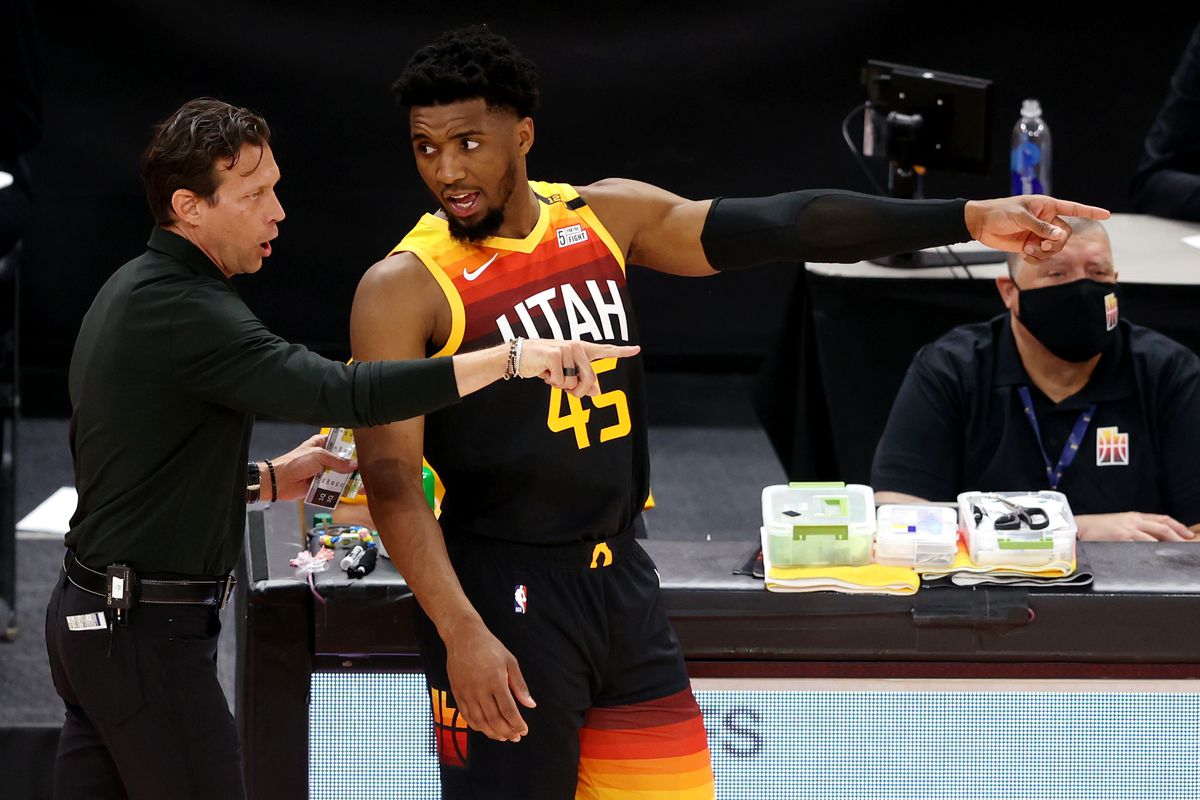 Utah Jazz coach Quin Snyder talks with Donovan Mitchell in Salt Lake City.