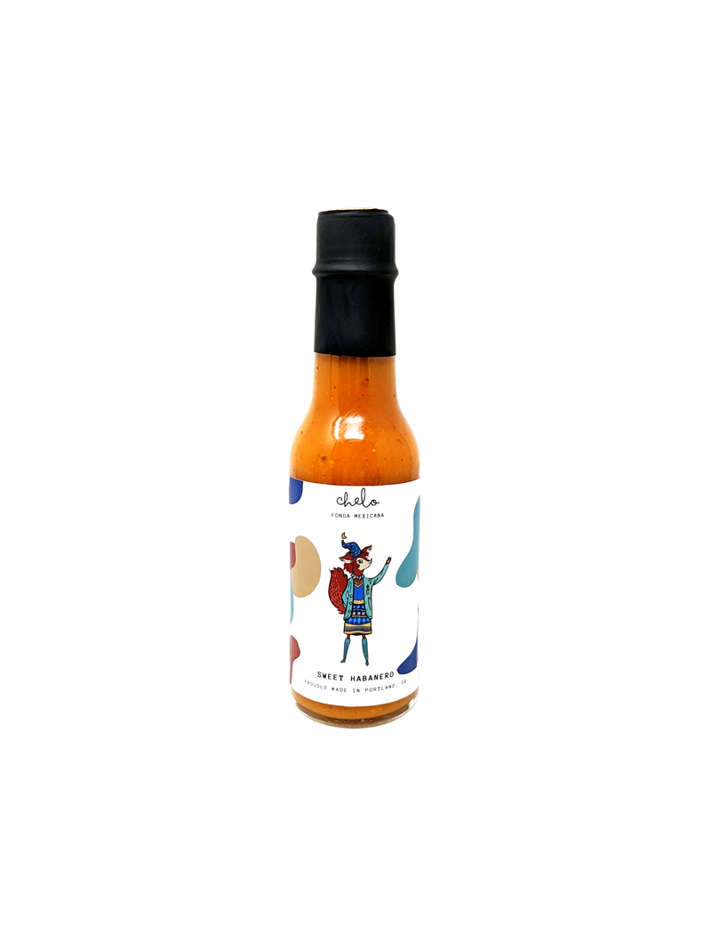 A bottle of Chelo hot sauce.