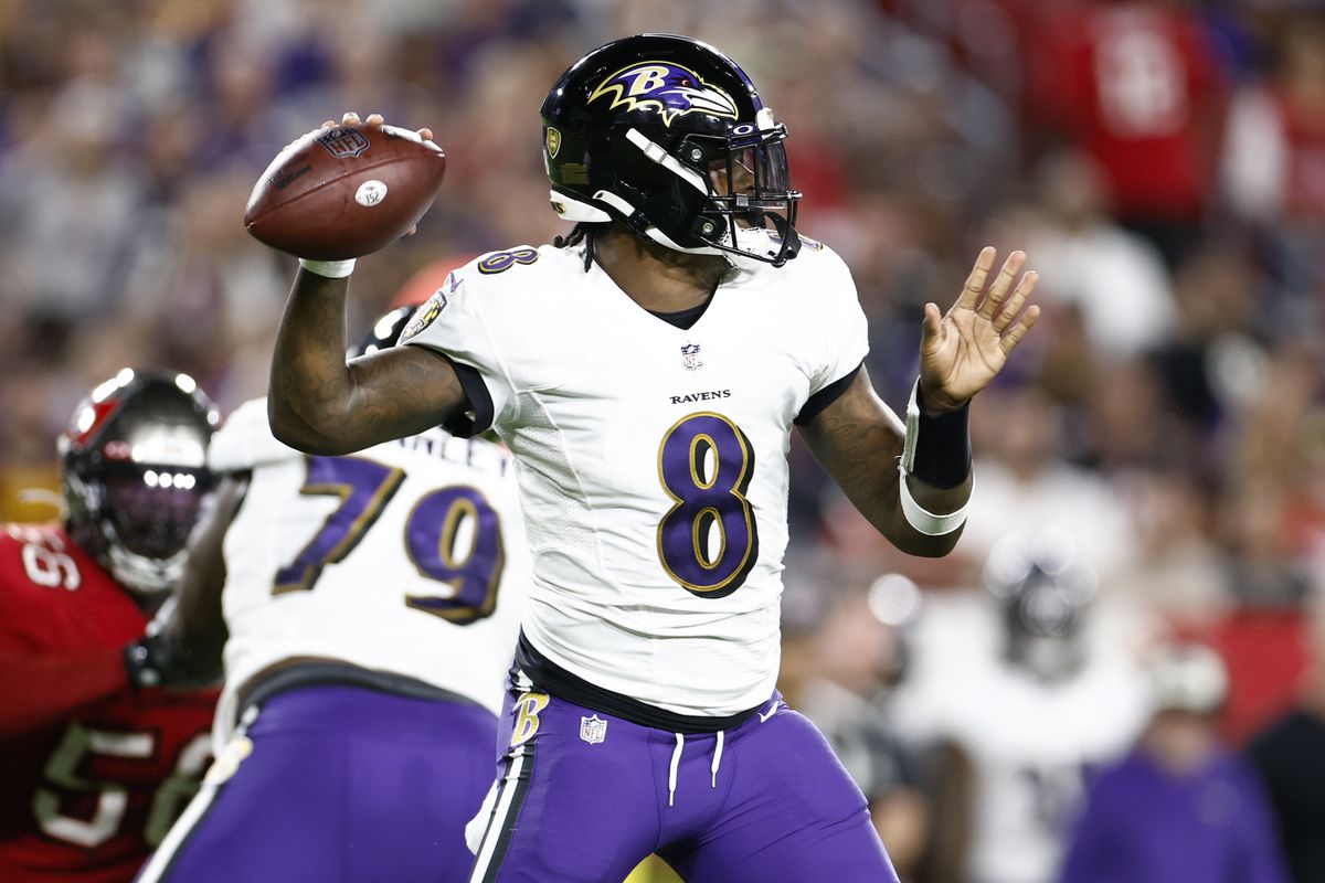 TAMPA, FLORIDA - OCTOBER 27: Lamar Jackson #8 of the Baltimore Ravens looks to pass the ball against the Tampa Bay Buccaneers during the first quarter at Raymond James Stadium on October 27, 2022 in Tampa, Florida.