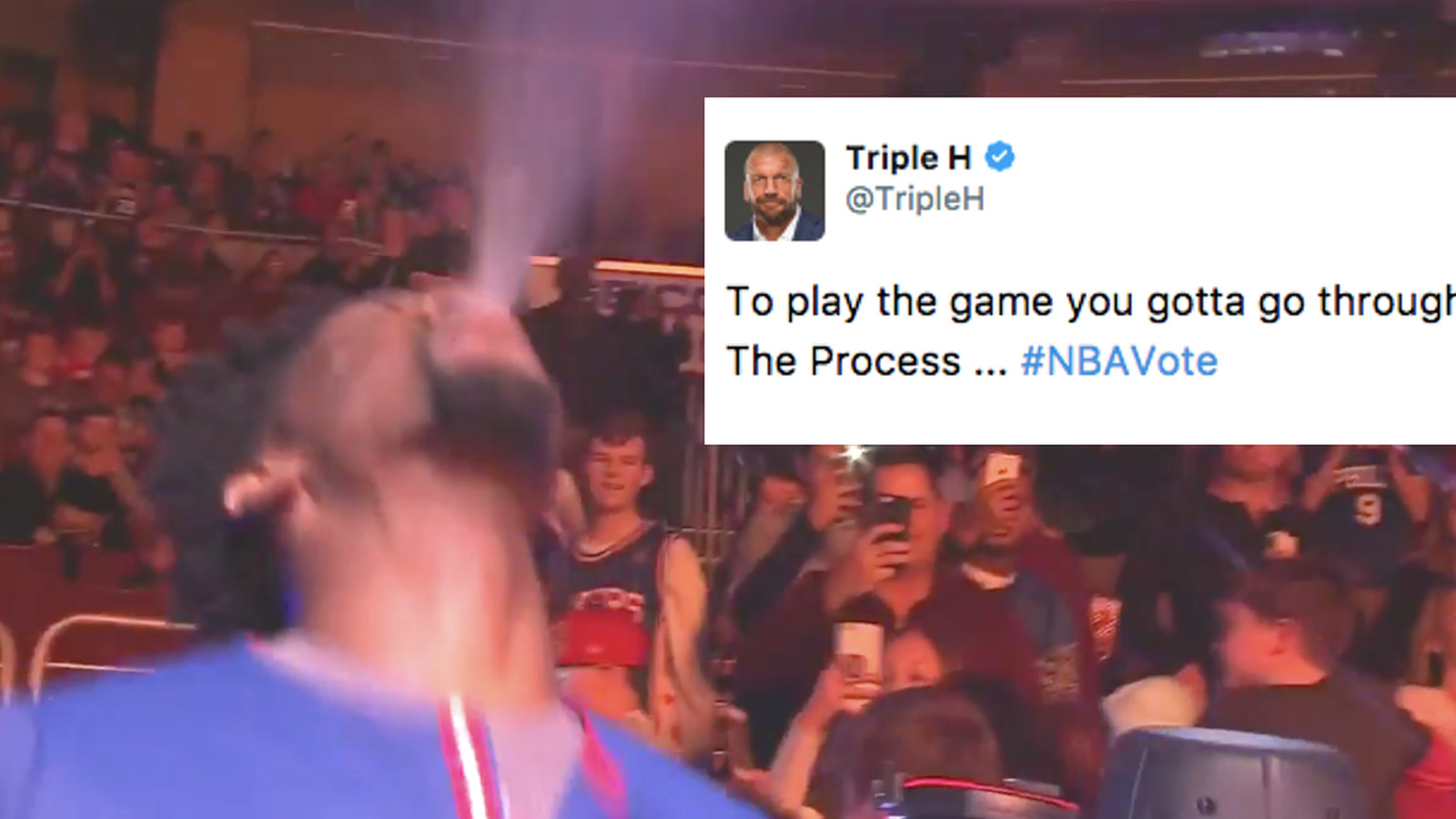 Joel Embiid paid homage to WWE's Triple H by copying his water