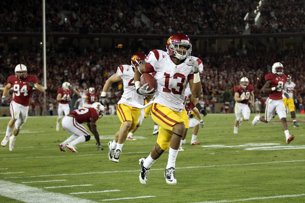 PALO ALTO, CA - OCTOBER 09:  Robert Woods #13 of the USC Trojans runs the ball in for a touchdown against the Stanford Cardinal at Stanford Stadium on October 9, 2010 in Palo Alto, California.  (Photo by Ezra Shaw/Getty Images)