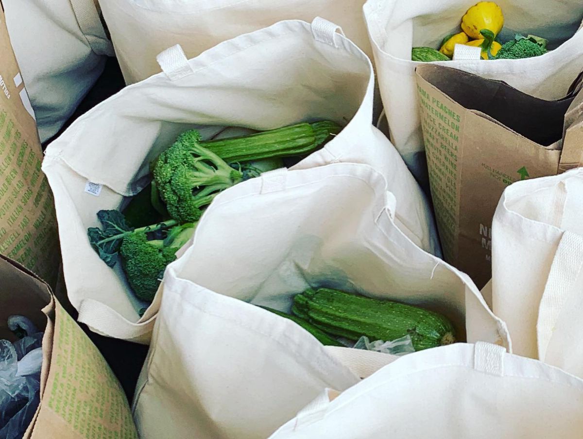 A collection of bags filled with vegetables associated with the COVID-19 Solidarity Network