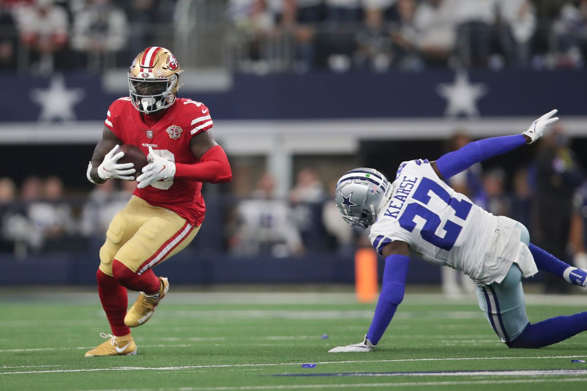 Deebo Samuel #19 of the San Francisco 49ers runs after making a catch during the NFC Wild Card Playoff game against the Dallas Cowboys at AT&amp;T Stadium on January 16, 2022 in Arlington, Texas. The 49ers defeated the Cowboys 23-17.