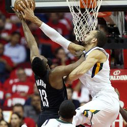 Utah Jazz center Rudy Gobert (27) blocks a shot by Houston Rockets guard James Harden (13) as the Utah Jazz and the Houston Rockets play game two of the NBA playoffs at the Toyota Center in Houston on Wednesday, May 2, 2018.