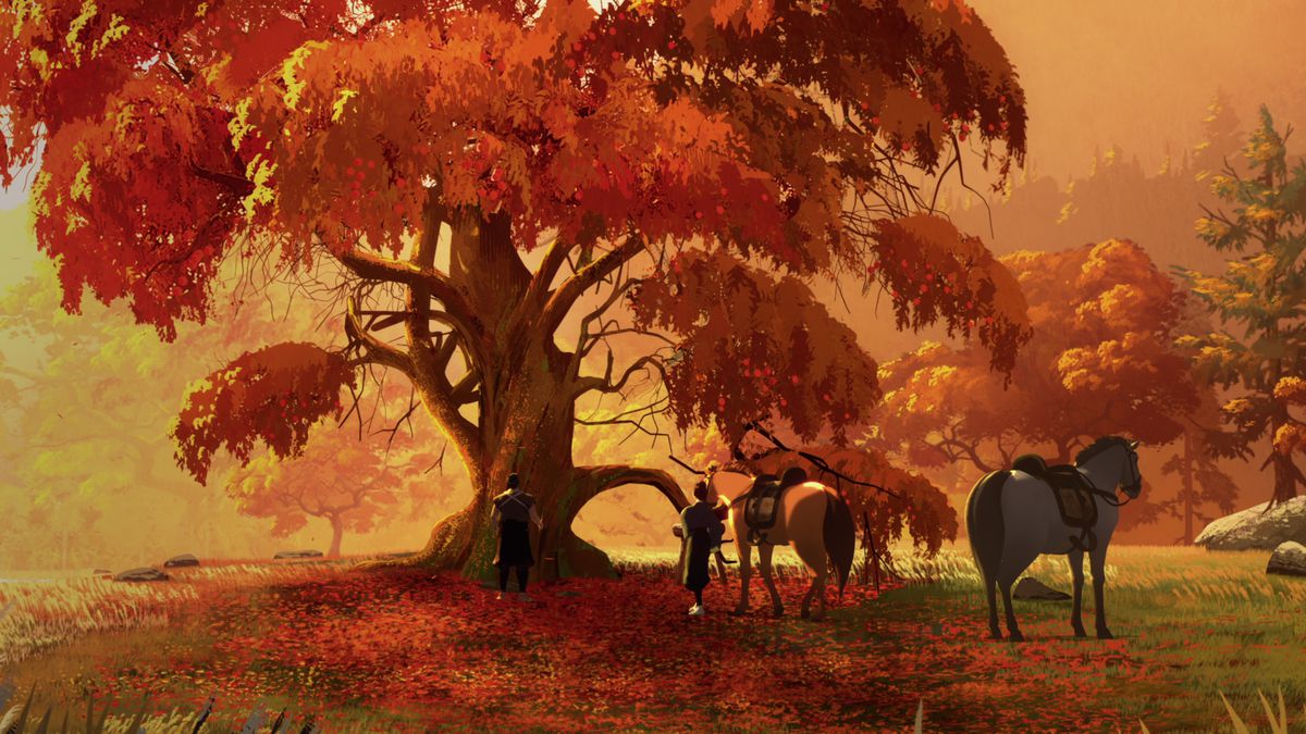 A huge tree in a wood full of fall colors, with two saddled horses and two humans standing in the fallen leaves.