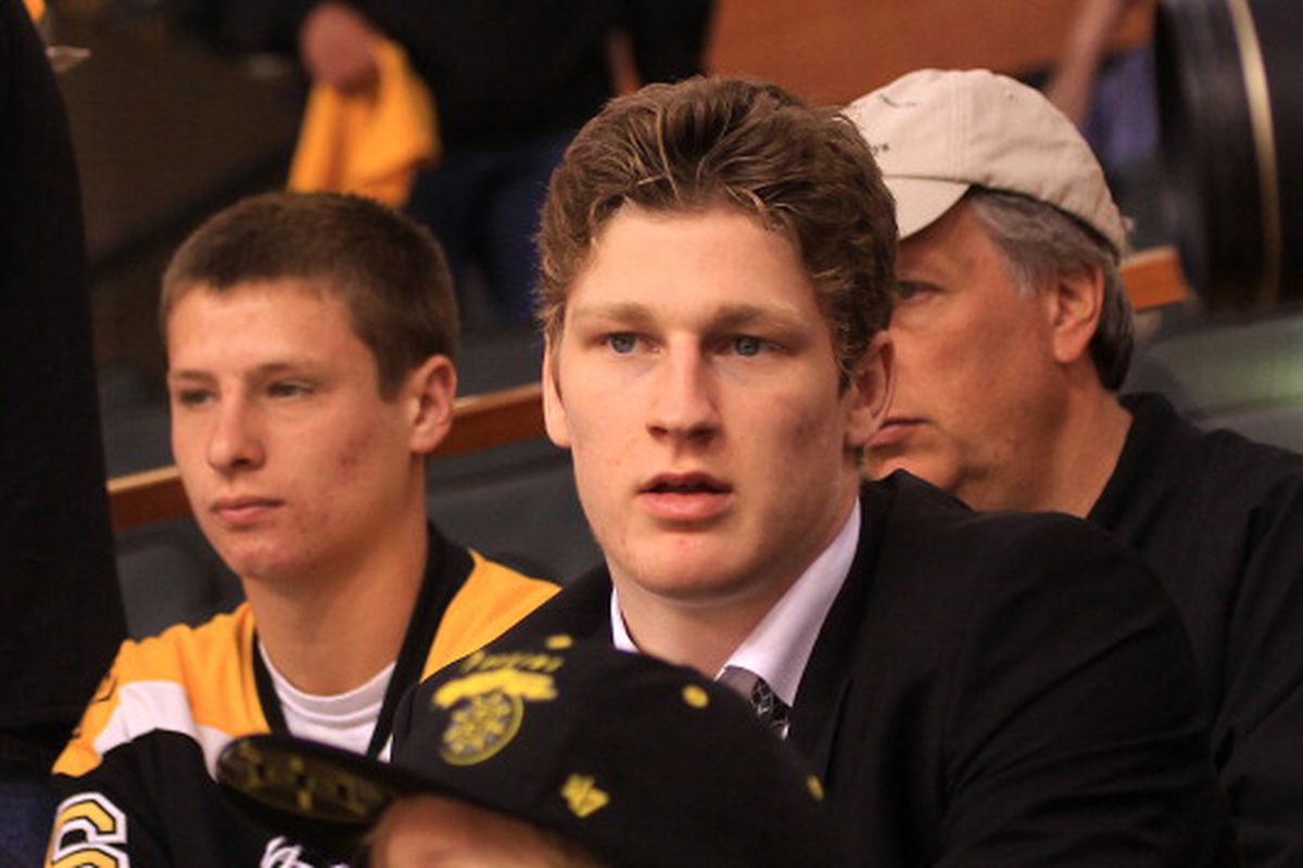 BOSTON, MA - JUNE 17: Nathan MacKinnon watches the game between the Chicago Blackhawks and the Boston Bruins in Game Three of the Stanley Cup Final at the TD Garden on June 17, 2013 in Boston, Massachusetts. 