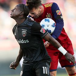 D.C. United forward Darren Mattocks (11) and Real Salt Lake midfielder Kyle Beckerman (5) battle for the ball as Real Salt Lake and D.C. United play an MLS Soccer match at Rio Tinto Stadium in Sandy on Saturday, May 12, 2018.