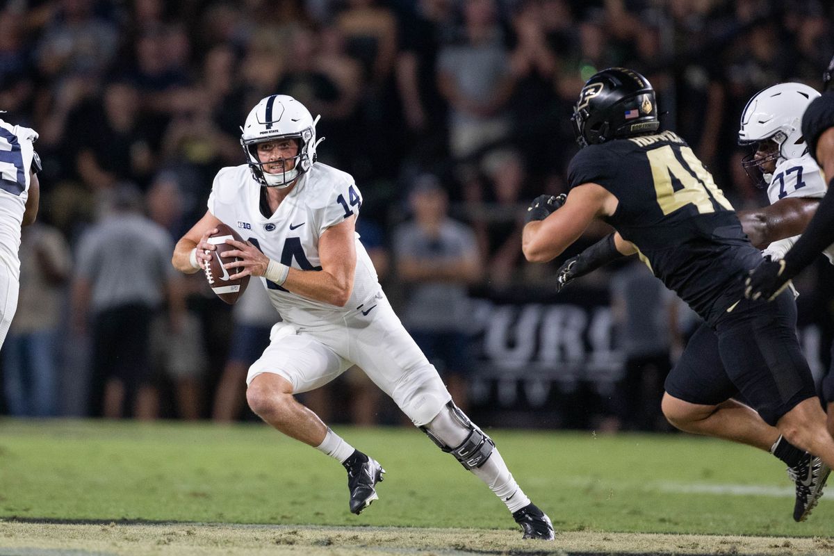 Sep 1, 2022; West Lafayette, Indiana, USA; Penn State Nittany Lions quarterback Sean Clifford (14) runs the ball in the second quarter against the Purdue Boilermakers at Ross-Ade Stadium.
