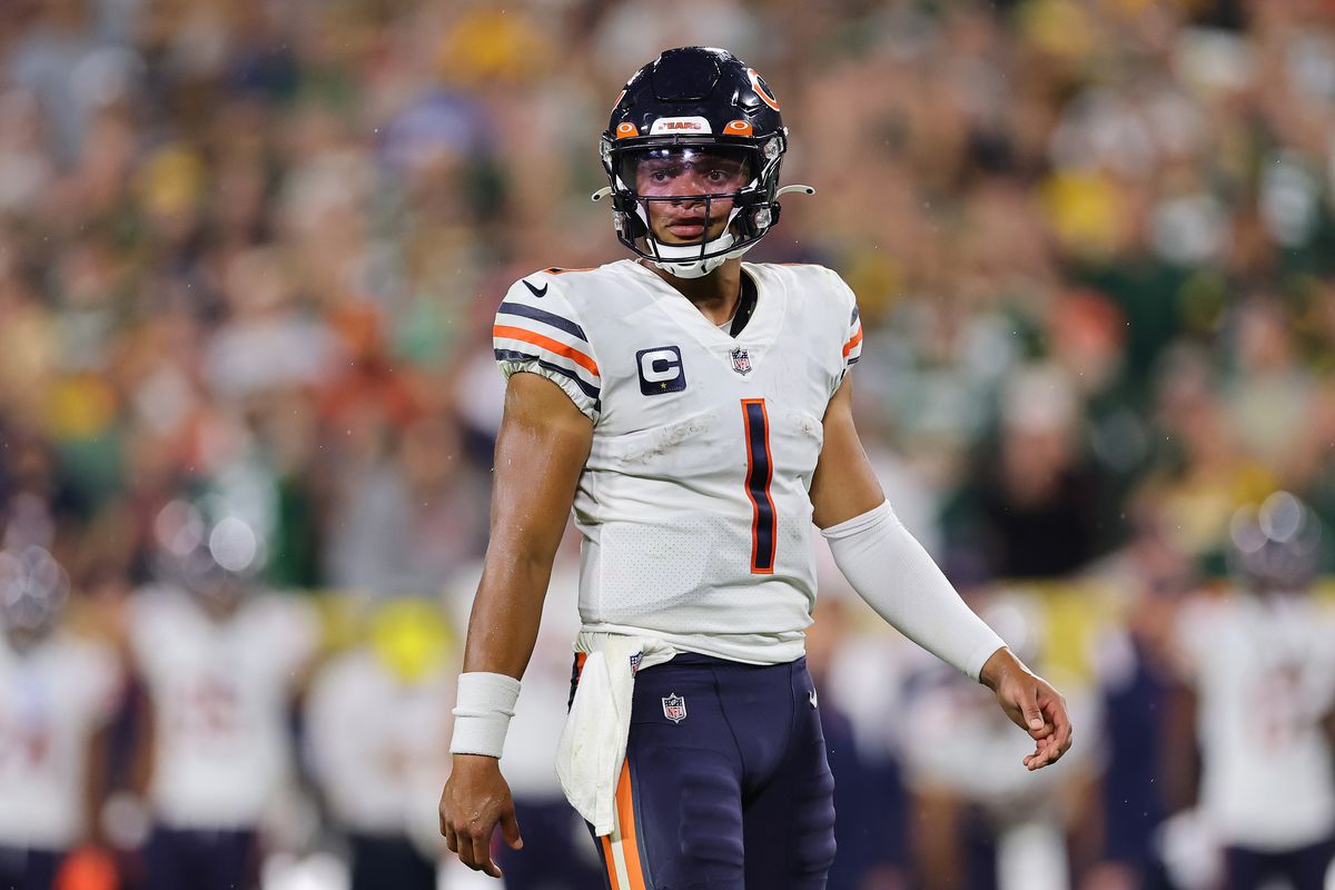 GREEN BAY, WISCONSIN - SEPTEMBER 18: Justin Fields #1 of the Chicago Bears looks on against the Green Bay Packers at Lambeau Field on September 18, 2022 in Green Bay, Wisconsin.