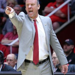 Utah Utes head coach Larry Krystkowiak shouts during a men's basketball game against the LSU Tigers at the Huntsman Center in Salt Lake City on Monday, March 19, 2018. Utah won 95-71.