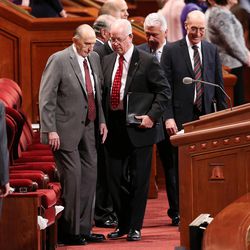 President Thomas S. Monson is assisted to his seat in the Conference Center in Salt Lake City at the beginning of the morning session of the LDS Church’s 187th Annual General Conference on Saturday, April 1, 2017.