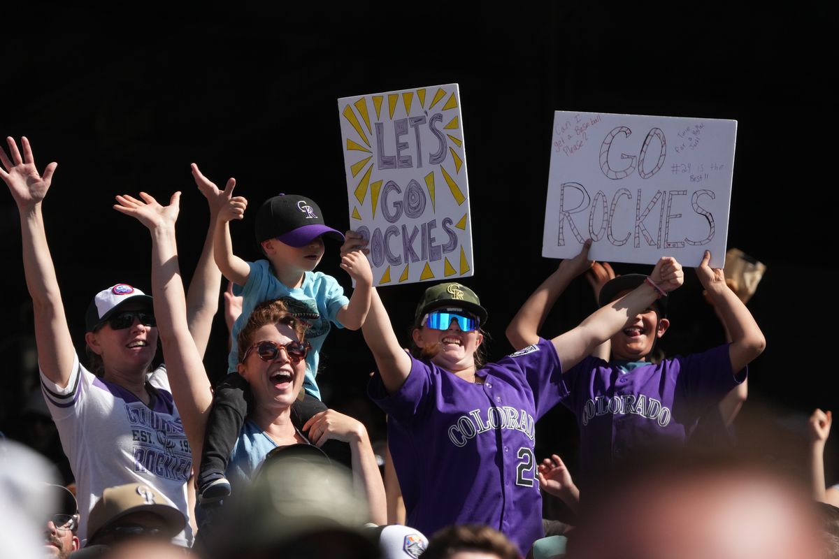 Denver, Colorado, USA; Colorado Rockies fans cheer during the seventh inning against the Miami Marlins at Coors Field.&nbsp;