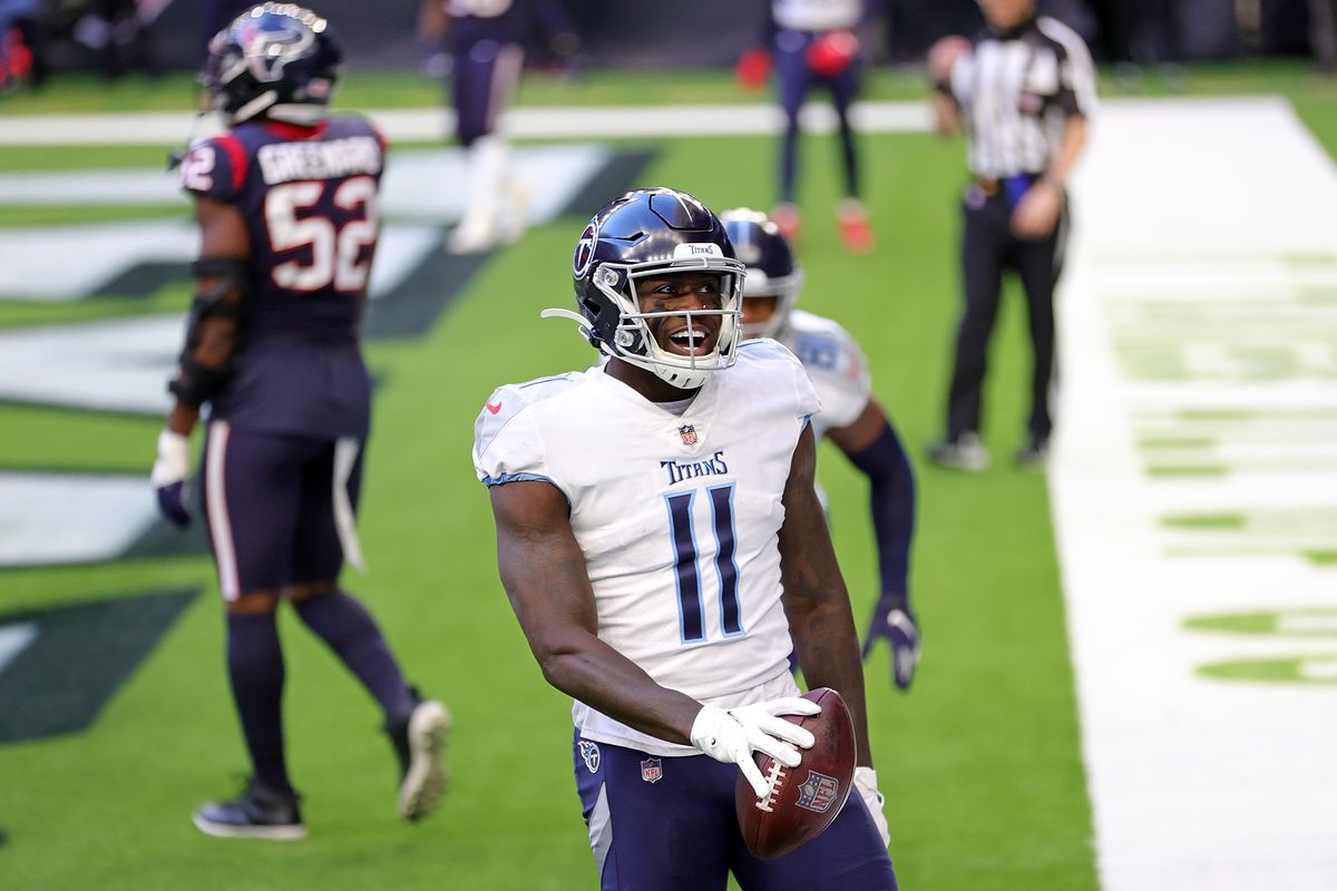 A.J. Brown of the Tennessee Titans celebrates a touchdown during the first half against the Houston Texans at NRG Stadium on January 03, 2021 in Houston, Texas.