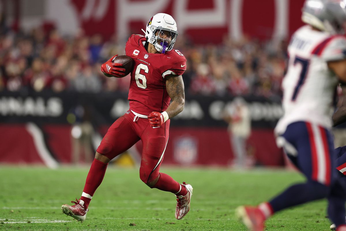 Running back James Conner #6 of the Arizona Cardinals rushes the football during the NFL game at State Farm Stadium on December 12, 2022 in Glendale, Arizona. The Patriots defeated the Cardinals 27-13.