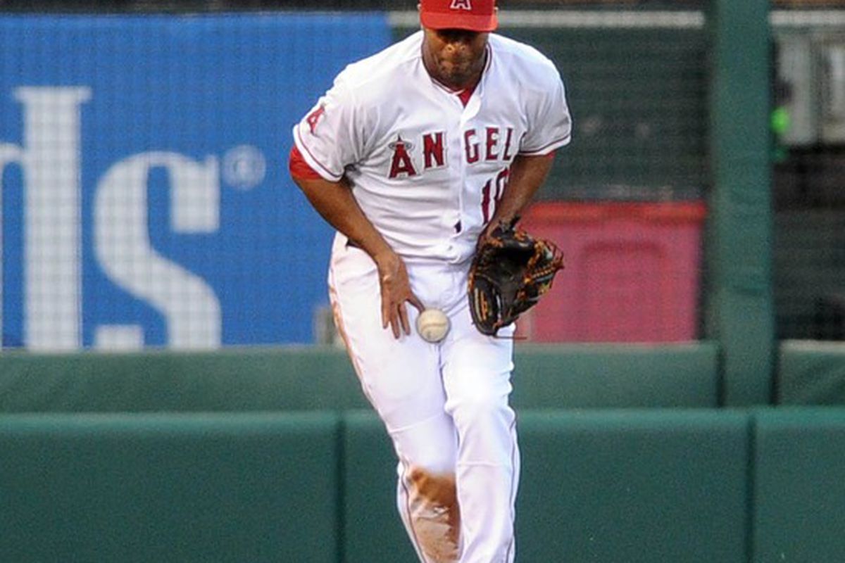 May 5, 2012; Anaheim, CA, USA; Los Angeles Angels left fielder Vernon Wells (10) fields a ball against the Toronto Blue Jays during the fifth inning at Angel Stadium of Anaheim.  The Angels won 6-2. Mandatory Credit: Kelvin Kuo-US PRESSWIRE