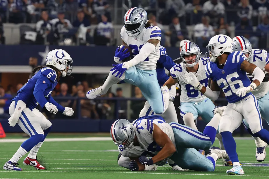 Ezekiel Elliott Salvation Army celebration video: Cowboys RB jumps in kettle after scoring late TD vs. Colts in Week 13