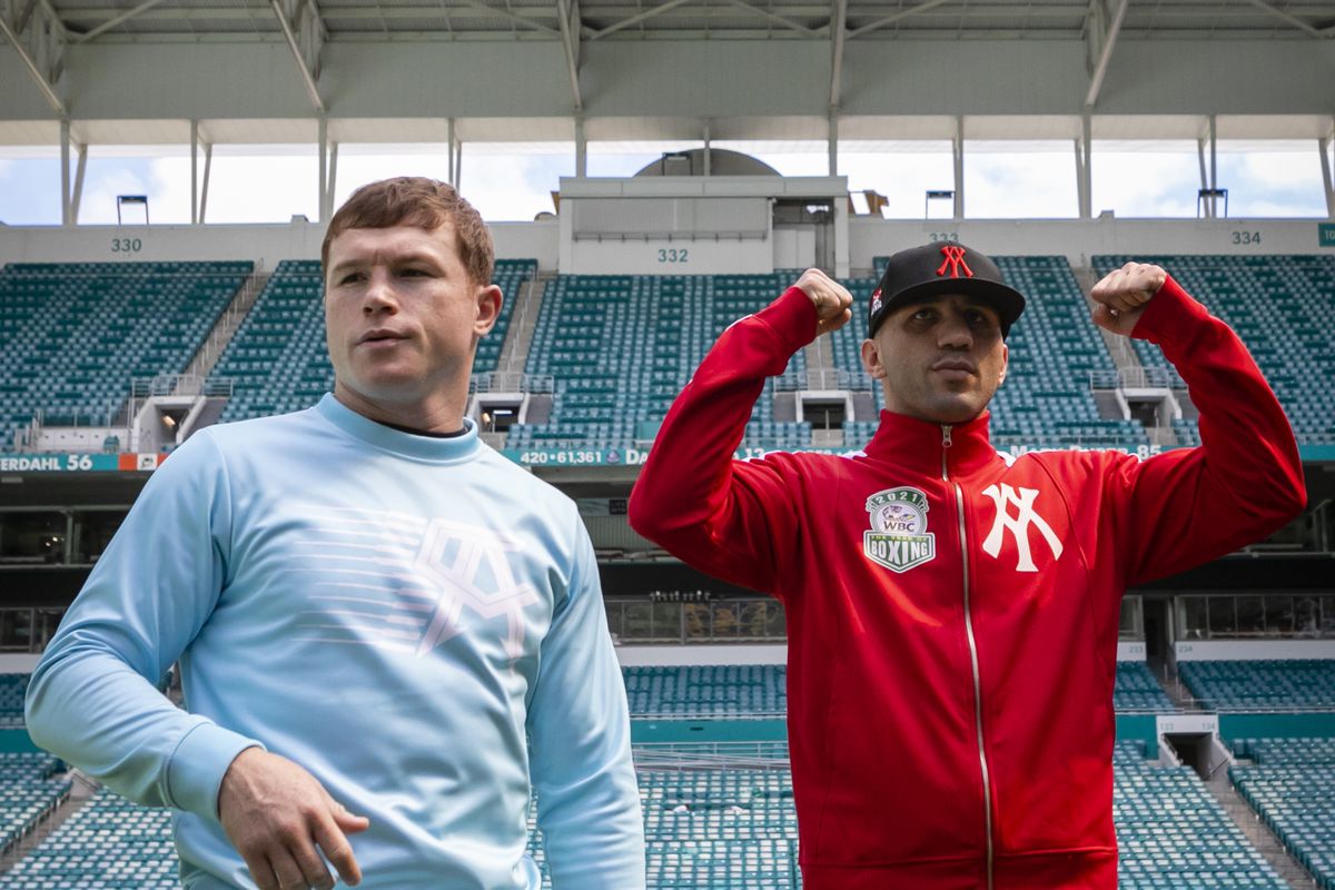 Professional boxer Avni Yildirim (R), and Saul Alvarez, of Mexico who currently holds World Boxing Association (WBA) and World Boxing Council (WBC) super middleweight belts (L), pose for a photo during a press conference prior to the boxing match, which will be held on Feb. 27, at Hard Rock Stadium, in Miami, Florida, United States on February 22, 2021.