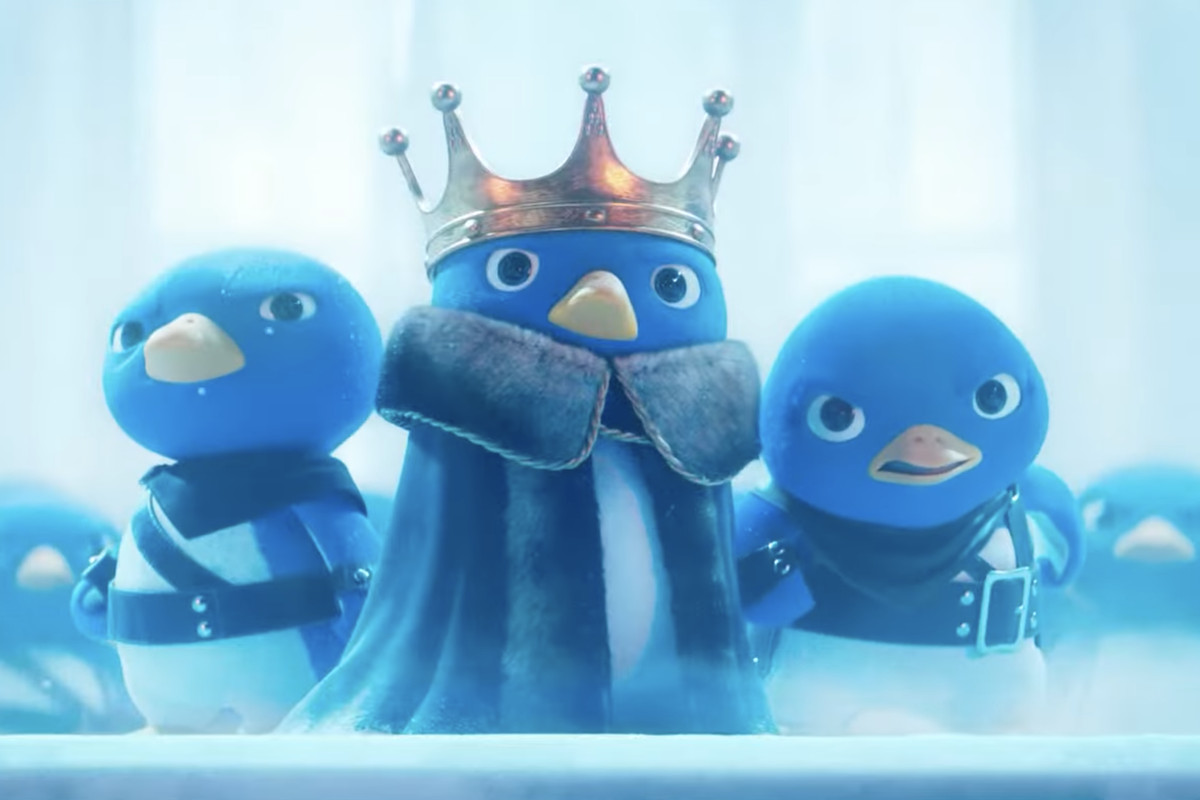 An image of 3D animated penguins standing in the Mario movie trailer. One is wearing a cloak and crown and had two other penguins sanding side by side. They look determined to win a fight with Bowser.
