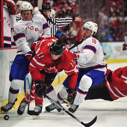 Canada's Patrick Marleau, second from left, races to the puck during the men's ice hockey preliminary game between Canada and Norway at the Canada Hockey Place during the 2010 Winter Olympics in Vancouver on Tuesday. For Canadian fans, ice hockey takes center stage, and they have high hopes for a gold medal.    