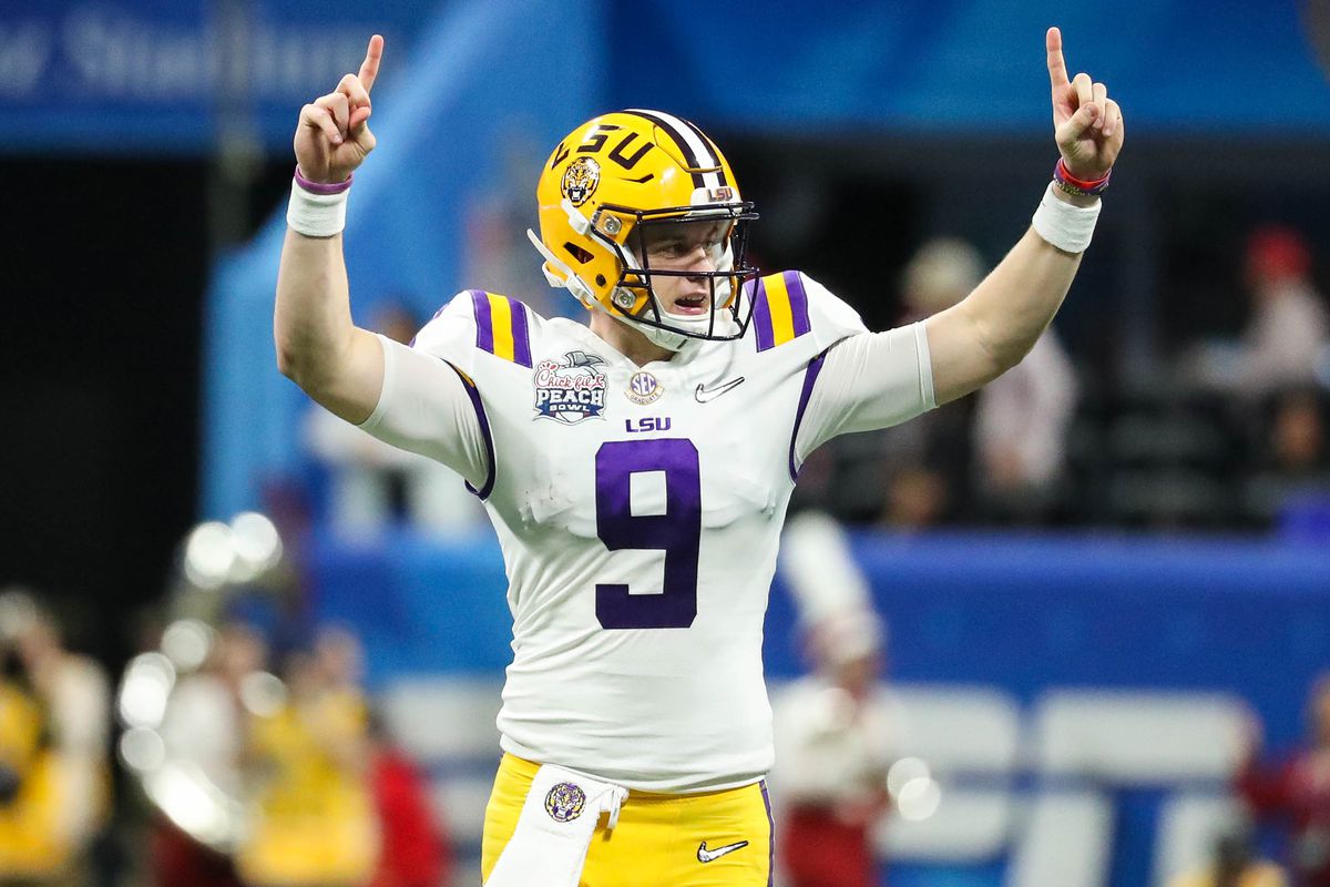 LSU Tigers quarterback Joe Burrow reacts during the second quarter of the 2019 Peach Bowl college football playoff semifinal game against the Oklahoma Sooners at Mercedes-Benz Stadium.