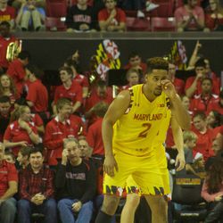 Melo Trimble looks on during the game.
