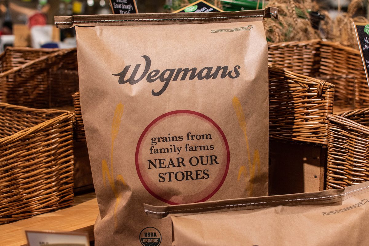 A close-up shot of a bag of Wegmans-branded grains