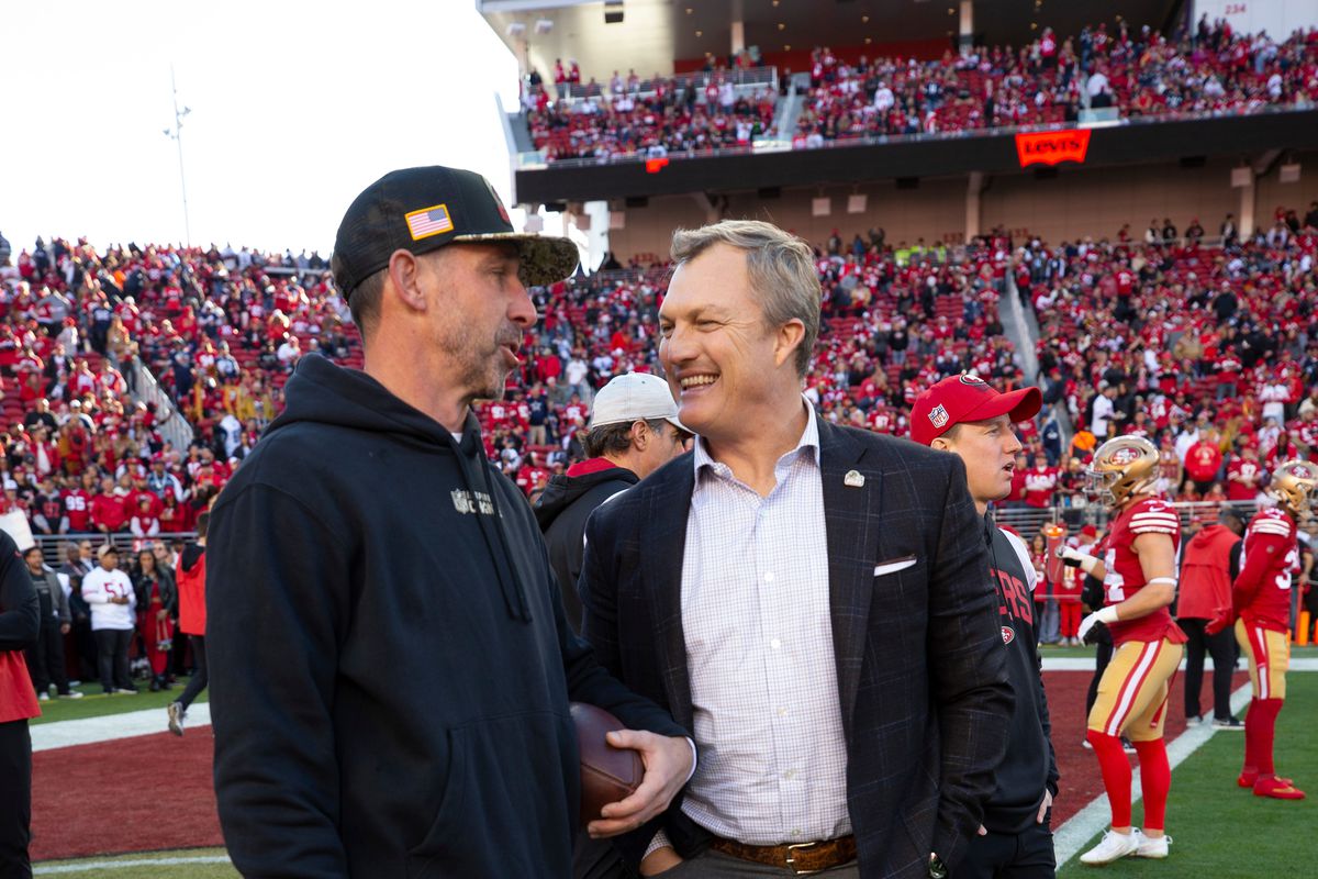 Head Coach Kyle Shanahan and General Manager John Lynch of the San Francisco 49ers on the field before the NFC Divisional playoff game against the Dallas Cowboys at Levi’s Stadium on January 22, 2023 in Santa Clara, California.