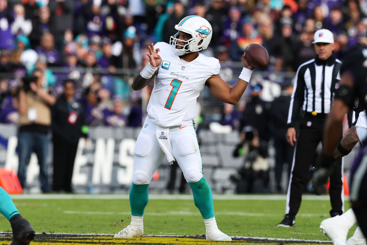 Tua Tagovailoa #1 of the Miami Dolphins throws a pass against the Baltimore Ravens during the first half of the game at M&amp;T Bank Stadium on December 31, 2023 in Baltimore, Maryland.
