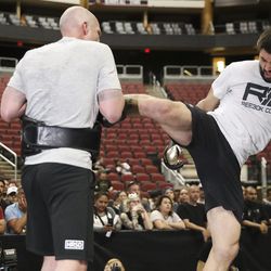 Carlos Condit slams kicks on the pads at the UFC on FOX 29 open workouts Wednesday inside Gila Rivera Arena in Glendale, Ariz.