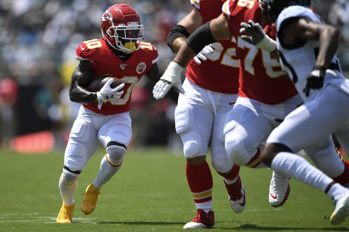 Kansas City Chiefs wide receiver Tyreek Hill runs the ball during the first quarter against the Jacksonville Jaguars at TIAA Bank Field.