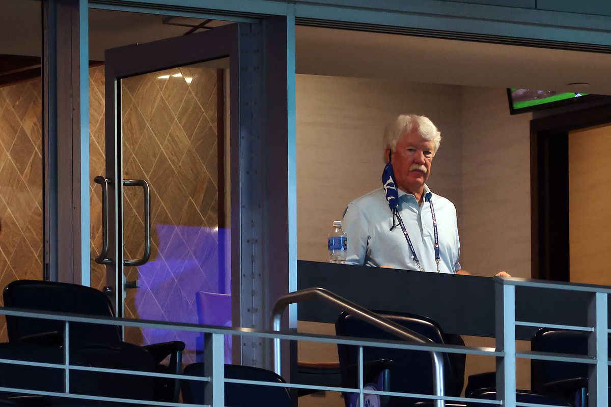 John Sherman watches from a stadium box