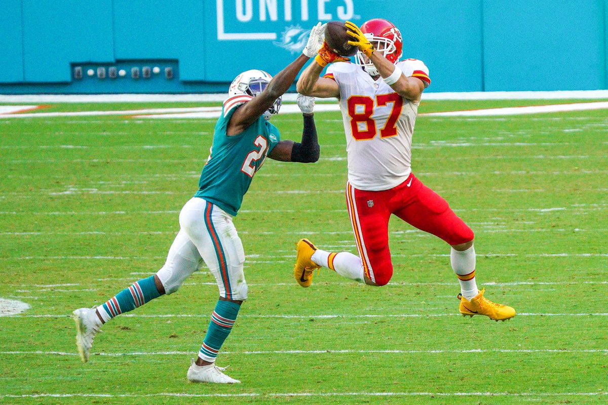 Travis Kelce #87 of the Kansas City Chiefs in action against the Miami Dolphins at Hard Rock Stadium on December 13, 2020 in Miami Gardens, Florida.