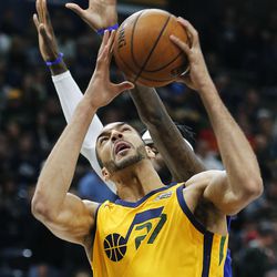 Utah Jazz center Rudy Gobert goes up for a shot during NBA basketball against the Los Angeles Clippers in Salt Lake City on Saturday, Jan. 20, 2018.