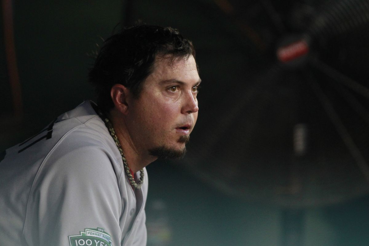 Jul 25, 2012; Arlington, TX, USA; Boston Red Sox starting pitcher Josh Beckett (19) in the dugout during the game against the Texas Rangers at Rangers Ballpark. The Rangers beat the Red Sox 5-3. Mandatory Credit: Tim Heitman-US PRESSWIRE