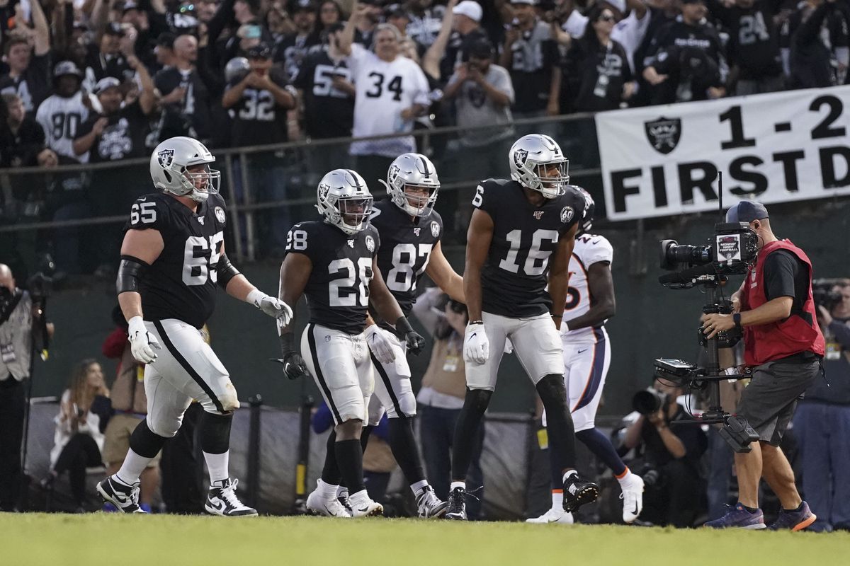 Oakland Raiders wide receiver Tyrell Williams celebrates after scoring a touchdown against the Denver Broncos during the first quarter at Oakland Coliseum.