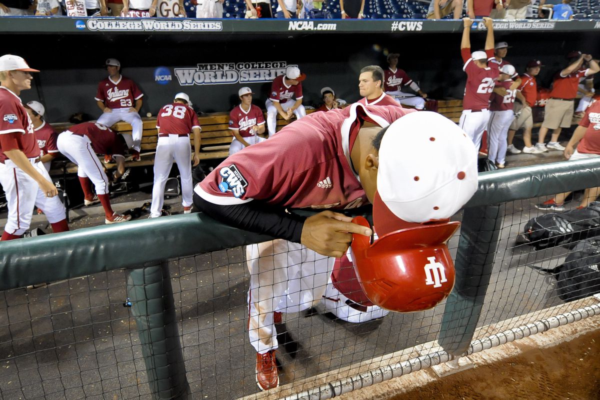 This Hoosier is puking into his helmet, which is not the best choice of rally cap antics.