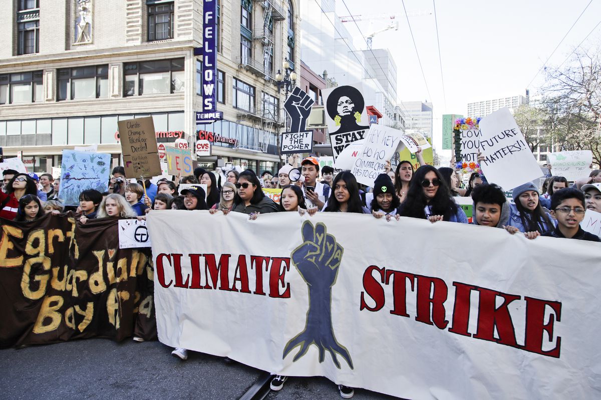 Students march along Market Street during a protest against climate change Friday, March 15, 2019, in San Francisco. 