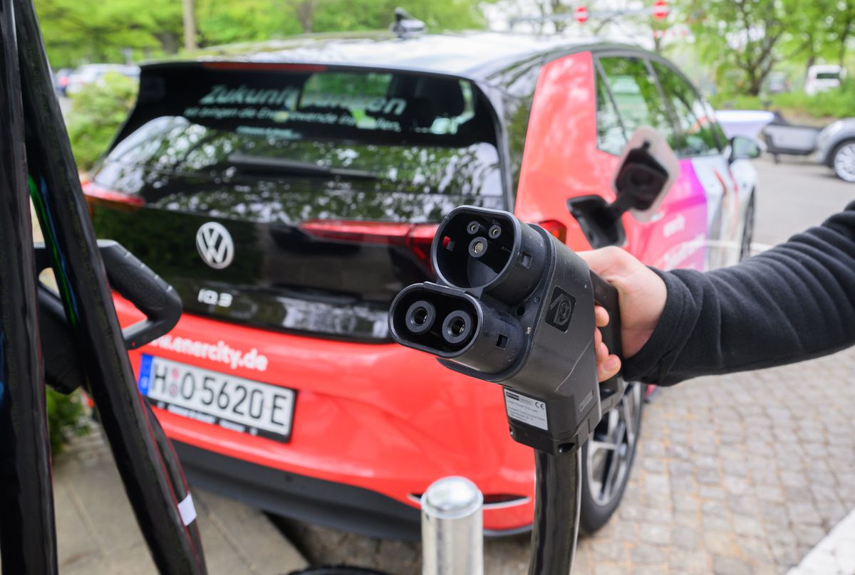 An electric car charges at a new fast charging station during a press event in Germany.