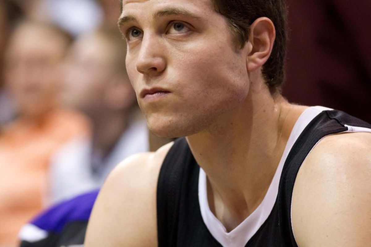 March 30, 2012; Salt Lake City, UT, USA; Sacramento Kings point guard Jimmer Fredette (7) watches from the bench during the first half against the Utah Jazz at Energy Solutions Arena. Mandatory Credit: Russ Isabella-US PRESSWIRE