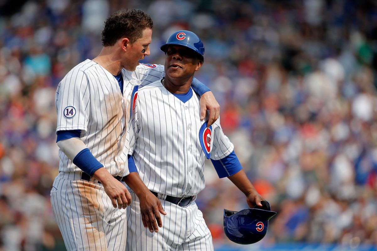 What are Chris Coghlan and Gary Jones saying to each other? Write your own caption.