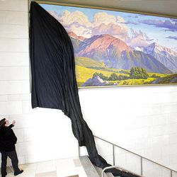 Utah artist David Meikle unveils "Wasatch Grandeur," his painting of Mount Olympus that's hanging at the new City Creek food court in the Key Bank building in Salt Lake City.