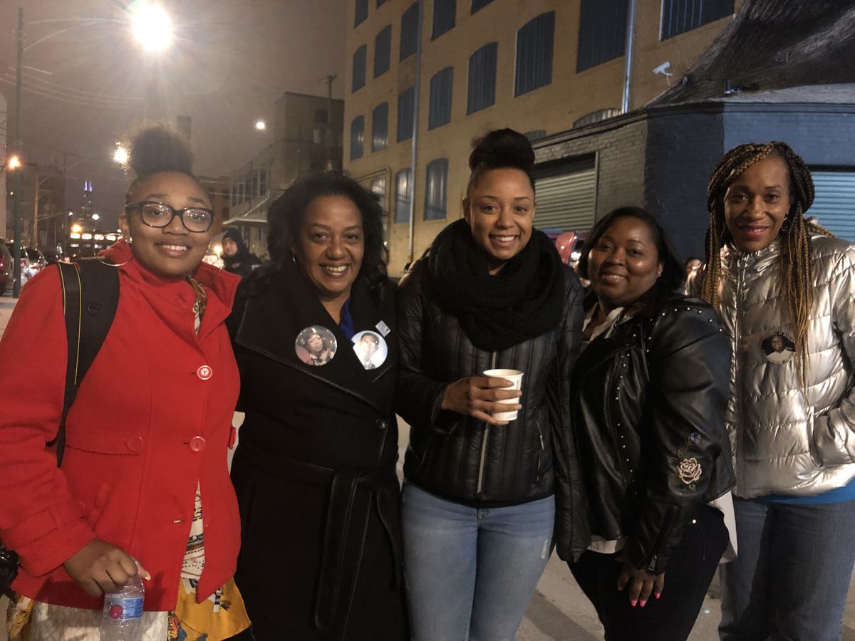 Delphine Cherry, second from left, is joined by her family to walk through The Most Dangerous Street — an exhibit created by the Illinois Council Against Handgun Violence on Thursday March 28. Cherry lost two of her children to Chicago gun violence and ha