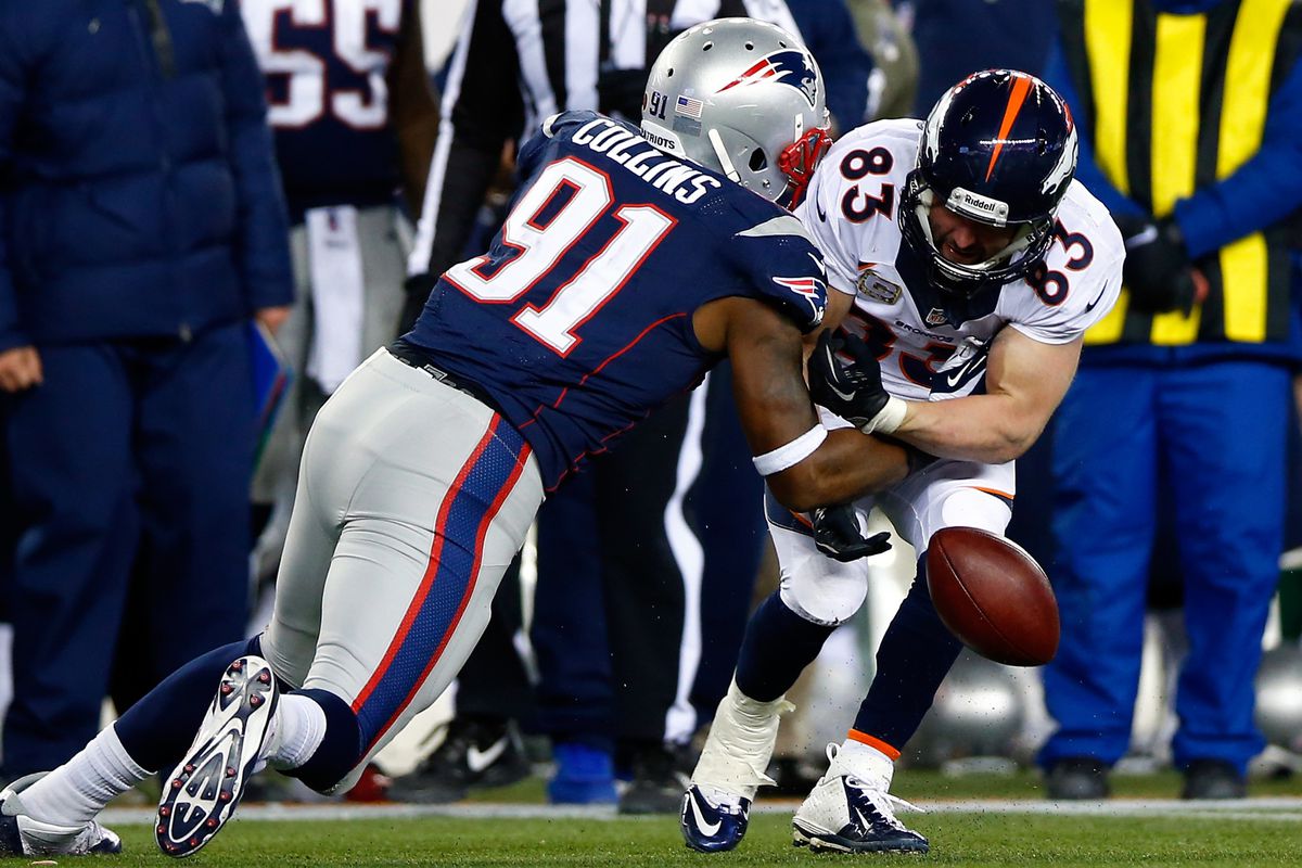 Jamie Collins breaks up a pass to Wes Welker.