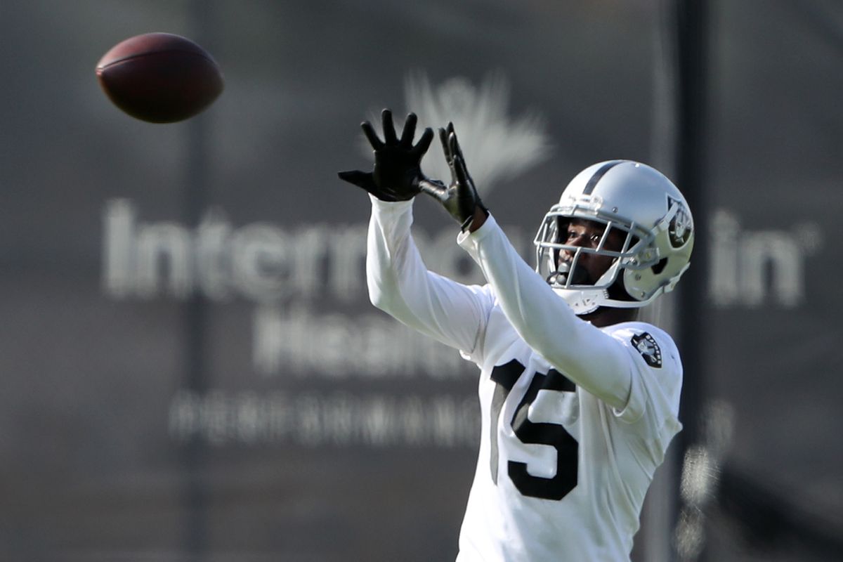 John Brown #15 of the Las Vegas Raiders catches a pass during training camp at the Las Vegas Raiders Headquarters/Intermountain Healthcare Performance Center on July 29, 2021 in Henderson, Nevada.