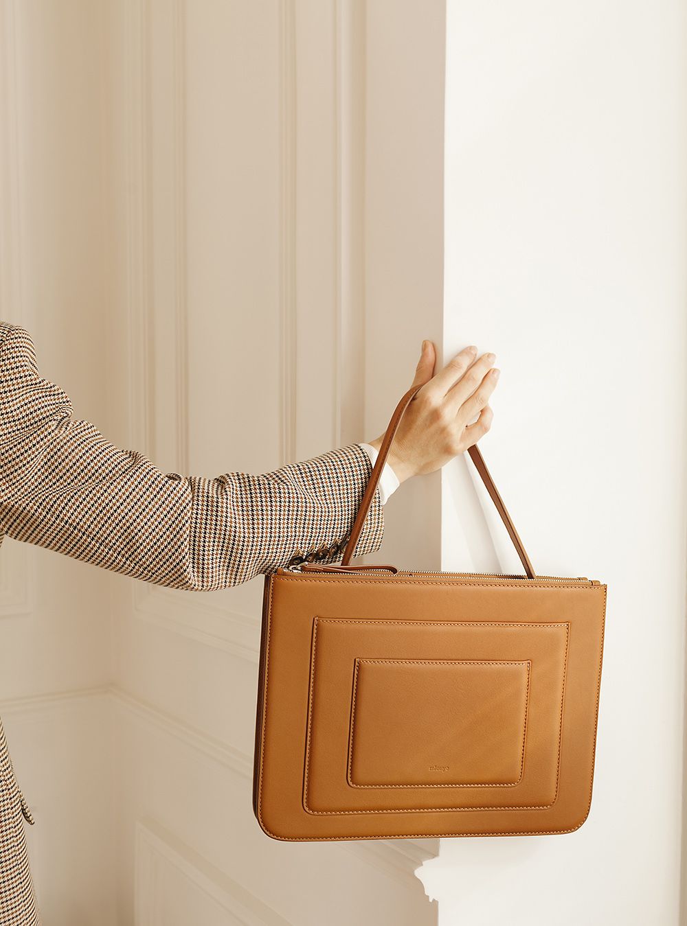 A campaign image for Mlouye purses